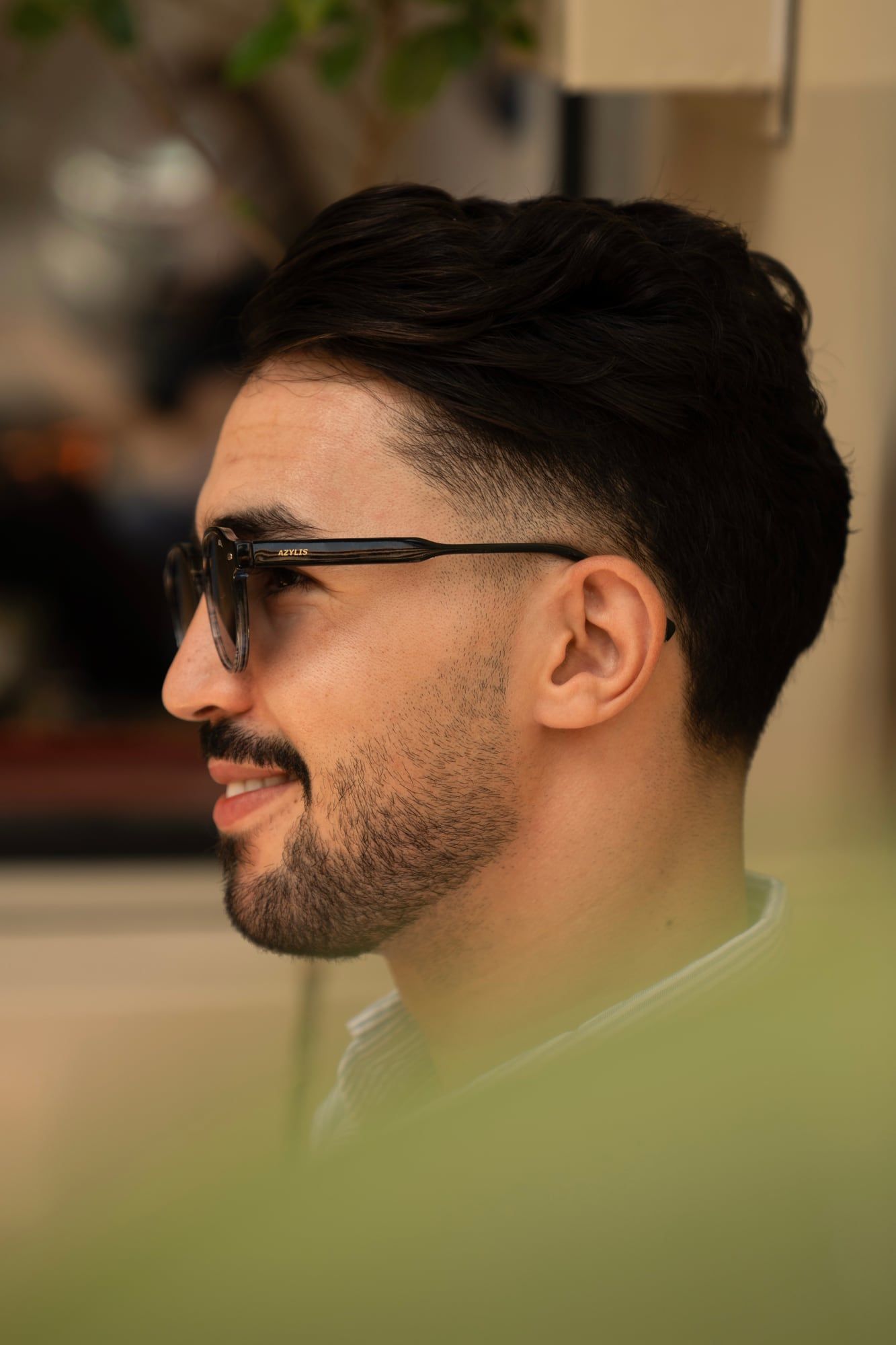 Profile portrait wearing Azylis sunglasses