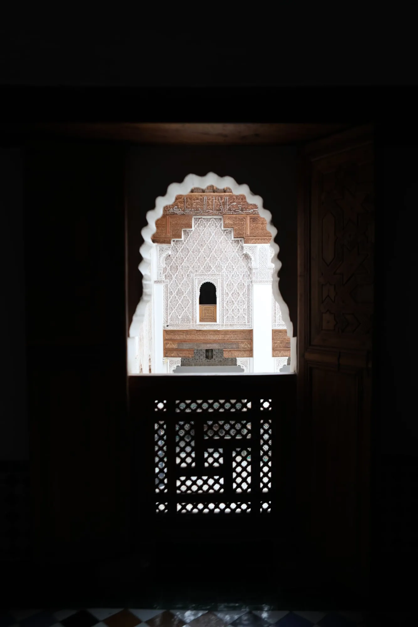 Carved window overlooking the courtyard of the Ben Youssef Madrasa in Marrakech