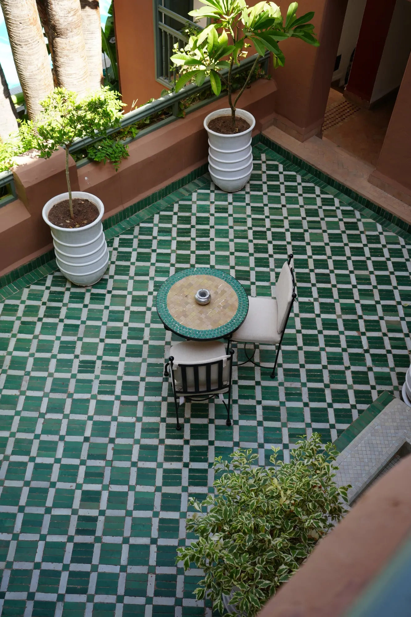 Riad terrace with green zellige floor seen from above