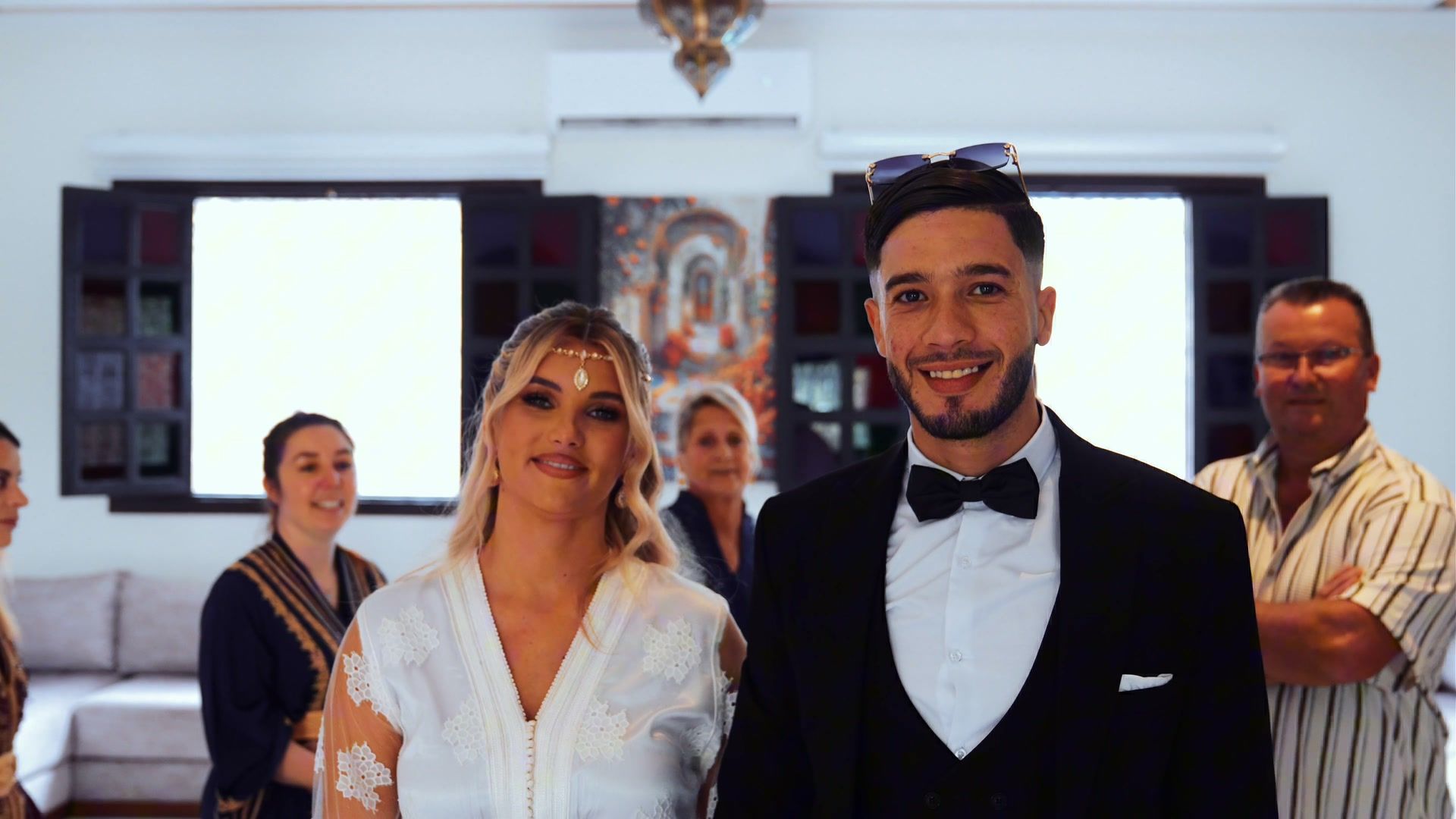 Bride and groom making their entrance in a riad in Marrakech